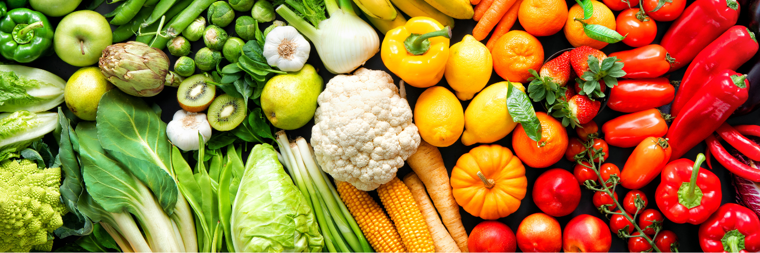 Colorful fruits and vegetables in a rainbow pattern