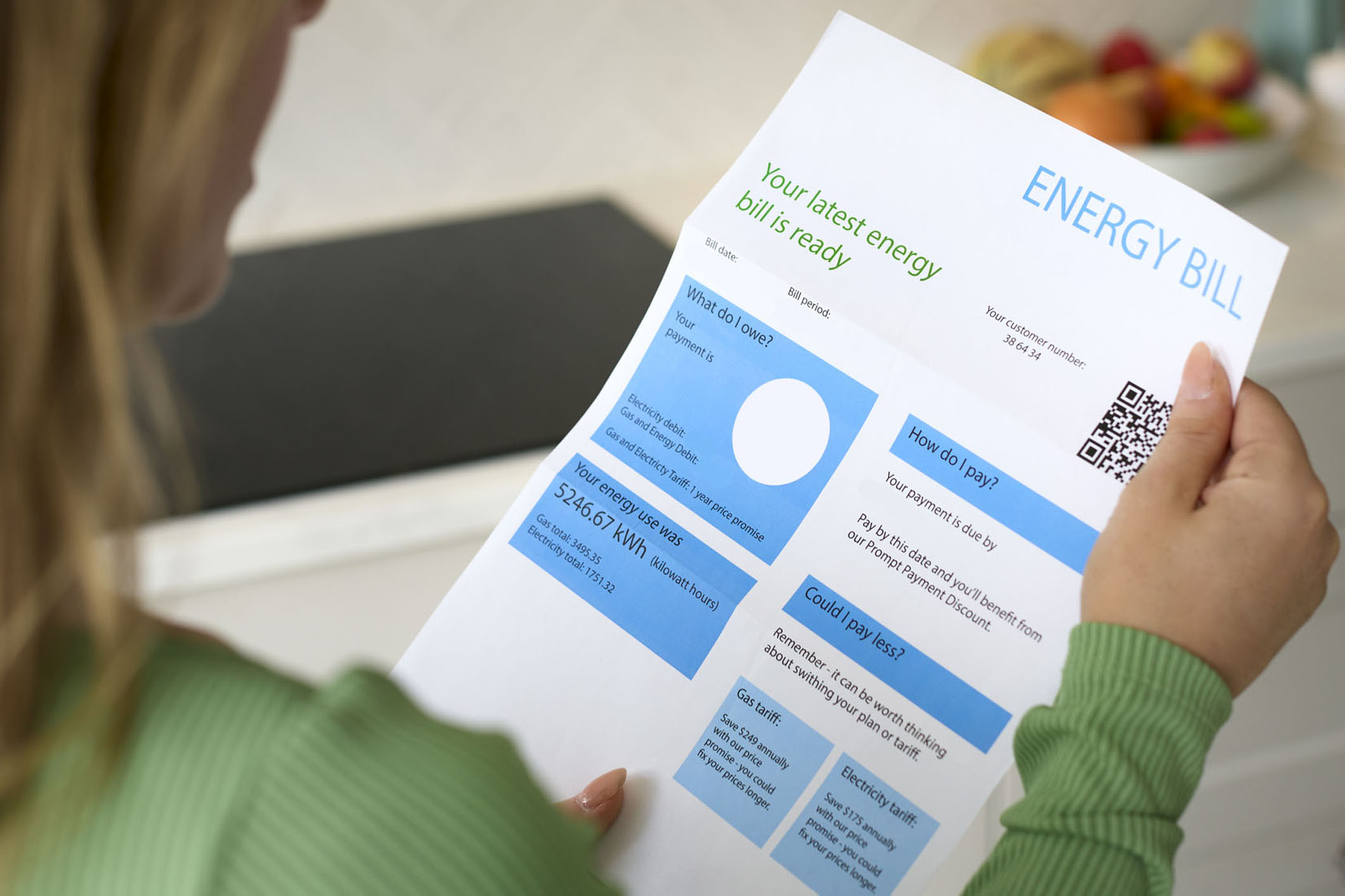 Woman looking at an energy bill