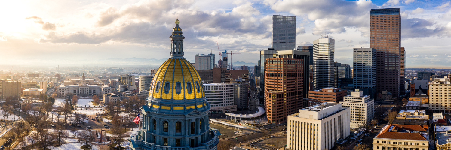 Aerial photo of Colorado Capitol with Denver skyline in background