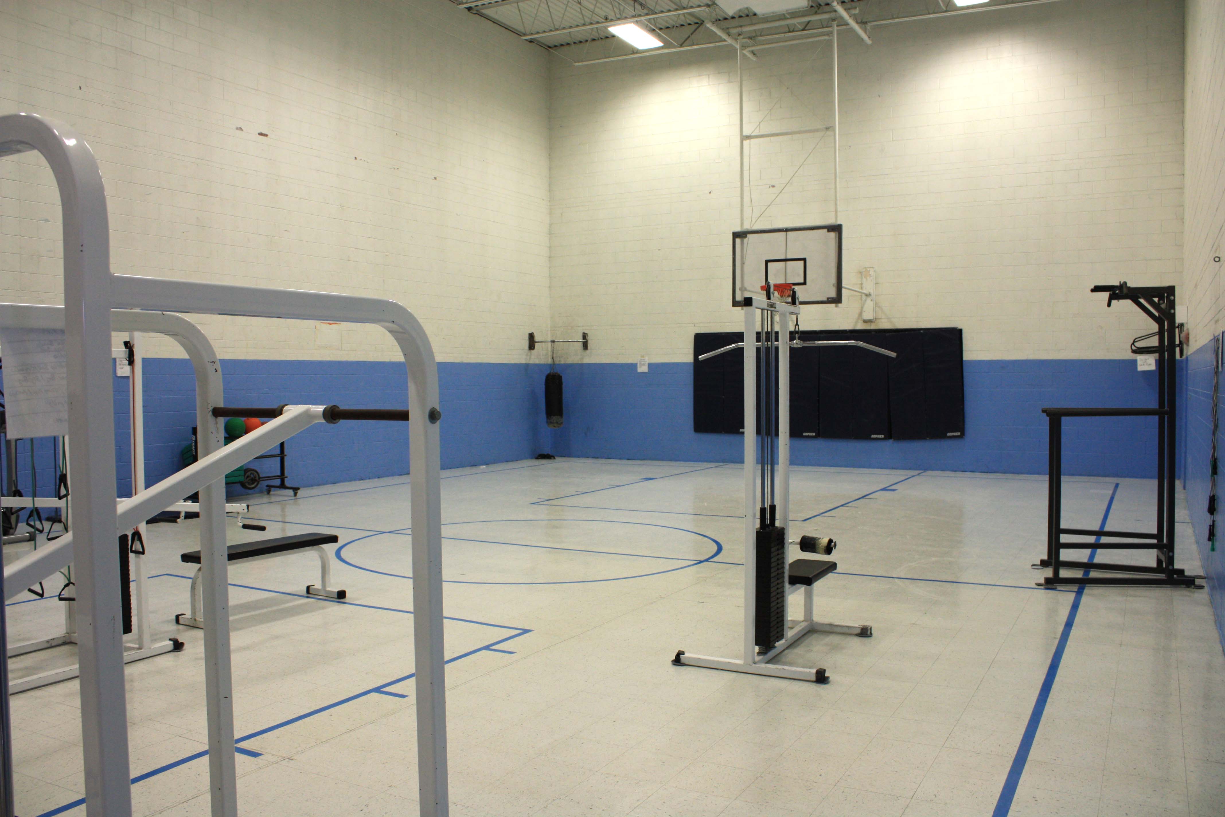 Gilliam Youth Services Center gymnasium with gym equipment