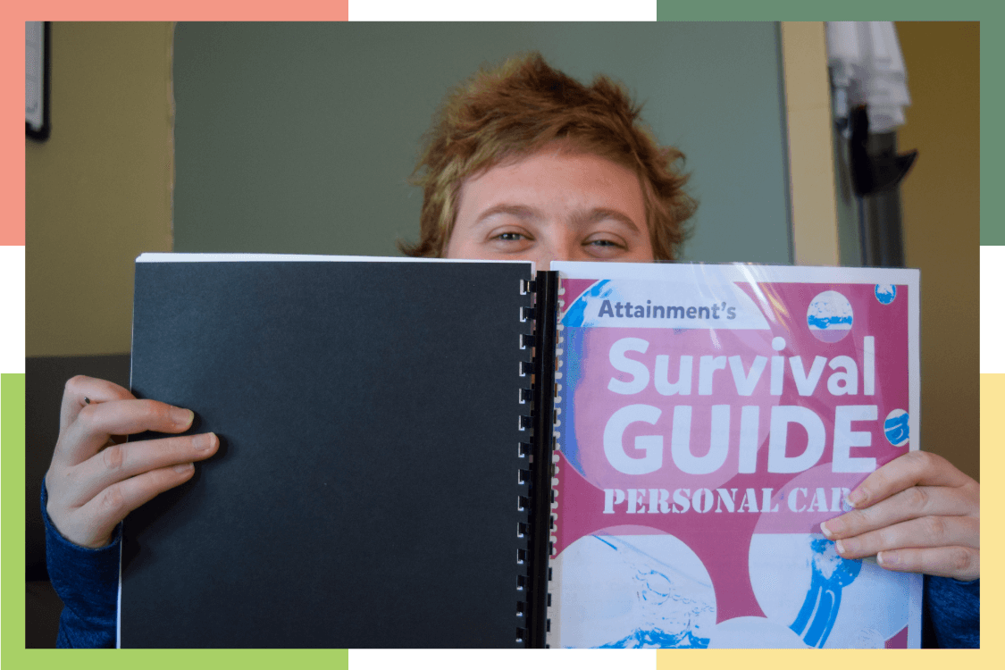 A female resident of Pubelo Regional Center holds up a lessons book titled "Survival Guide: Personal Care": 