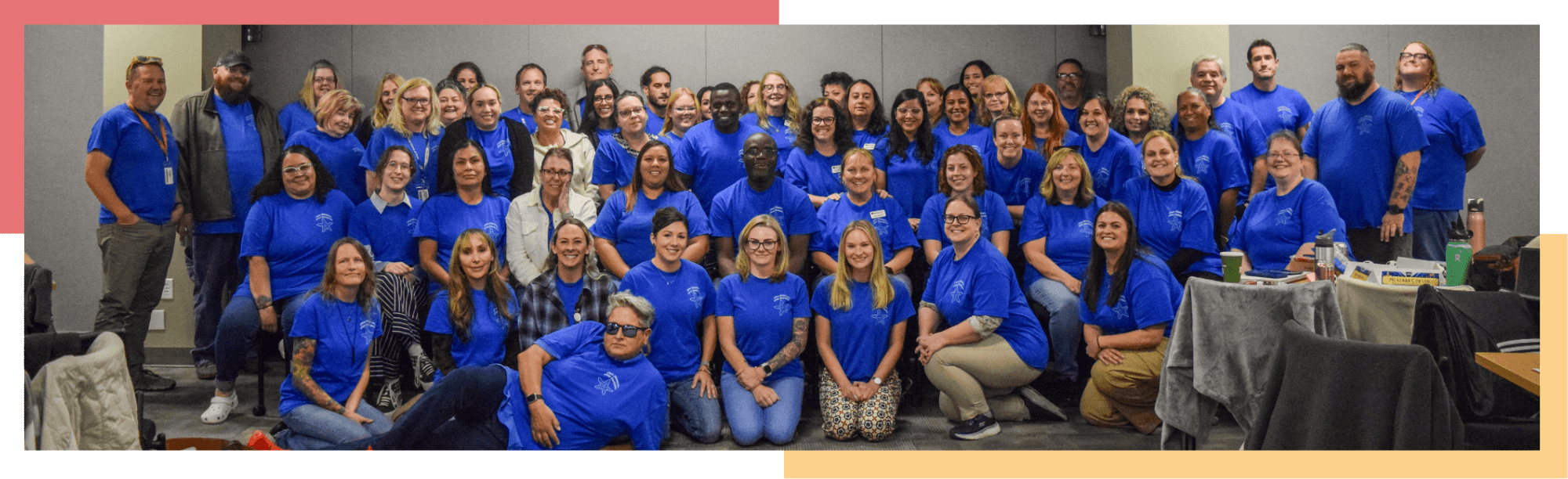 DRC staff smile for group photo