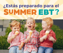 Three children sitting together and happily eating ice cream