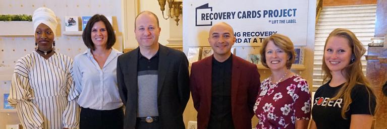 Recovery Cards Project Group Picture with Gov. Polis