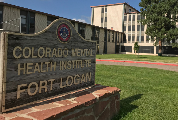 Photograph of sign reading "Colorado Mental Health Institute Fort Logan"