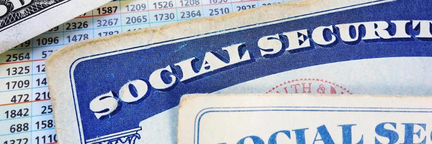 Illustration of Social Security cards and cash sitting on top of numerical tables